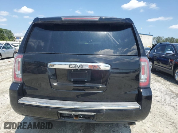 2015 GMC Yukon Denali with VIN 1GKS1CKJ6FR282196, listed as a Copart auction lot 66507573 with 194,391 mi miles. Bid and sale history available at carsss.com. Image 6.
