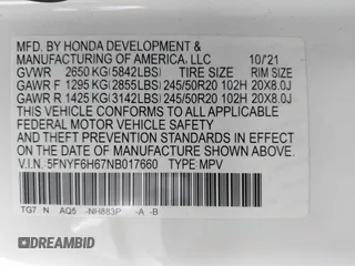 2022 Honda Pilot Touring 7-Passenger with VIN 5FNYF6H67NB017660, listed as a IAAI auction lot 41194603 with 87,301 mi miles. Bid and sale history available at carsss.com. Image 9.