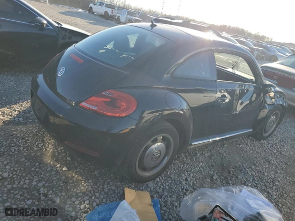 2012 Volkswagen Beetle 2.5L w/Sun/Sound/Nav PZEV with VIN 3VWJP7AT0CM645263, listed as a Copart auction lot 42690475 with 166,549 mi miles and Salvage Title. Bid and sale history available at carsss.com. Image 3.