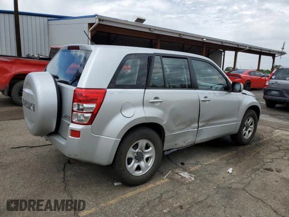 2008 Suzuki Grand Vitara w/Spare & Cargo Covers with VIN JS3TD941784100899, listed as a Copart auction lot 62581725 with 104,502 mi miles and Salvage title. Bid and sale history available at DreamBid. Image 3.