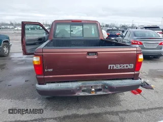 2003 Mazda B-Series 2WD Truck DS with VIN 4F4YR16U83TM17272, listed as a IAAI auction lot 41387645 with 162,810 mi miles. Bid and sale history available at carsss.com. Image 16.