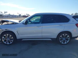 2018 BMW X5 xDrive40e iPerformance with VIN 5UXKT0C53J0W00910, listed as a IAAI auction lot 41842046 with 48,838 mi miles. Bid and sale history available at carsss.com. Image 14.