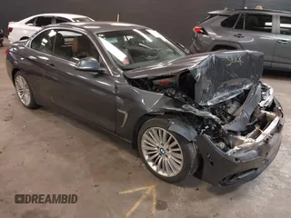2014 BMW 4 Series 428i xDrive with VIN WBA3T1C59EPS98299, listed as a IAAI auction lot 41741235 with 93,000 mi miles and . Bid and sale history available at carsss.com. Image 1.
