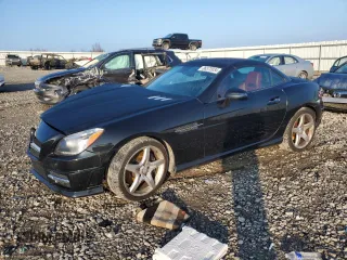 2015 Mercedes-Benz SLK-Class SLK 250 with VIN WDDPK4HA3FF098739, listed as a Copart auction lot 86572034 with 90,453 mi miles and Salvage Title. Bid and sale history available at carsss.com. Image 1.