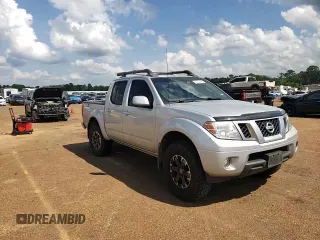 2016 Nissan Frontier Pro-4X with VIN 1N6AD0EV0GN797437, listed as a Copart auction lot 54203245 with 131,021 mi miles and Salvage title. Bid and sale history available at DreamBid. Image 13.