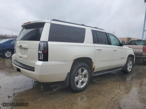 2015 Chevrolet Suburban LT with VIN 1GNSKJKCXFR248641, listed as a Copart auction lot 52033805 with 212,189 mi miles and Clean Title. Bid and sale history available at carsss.com. Image 3.