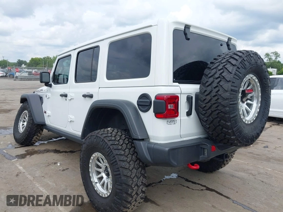 2021 Jeep Wrangler Unlimited Rubicon with VIN 1C4HJXFG7MW527498, listed as a IAAI auction lot 42393520 with 18,085 mi miles and . Bid and sale history available at DreamBid. Image 3.