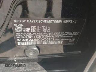 2012 BMW 5 Series 528i with VIN WBAXG5C58CDX05153, listed as a IAAI auction lot 42196906 with 120,652 mi miles. Bid and sale history available at carsss.com. Image 9.