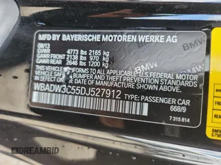 2013 BMW 3 Series 328i with VIN WBADW3C55DJ527912, listed as a Copart auction lot 63317685 with 77,082 mi miles and Salvage title. Bid and sale history available at DreamBid. Image 12.