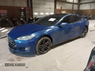 2014 Tesla Model S 60 with VIN 5YJSA1H1XEFP30497, listed as a IAAI auction lot 41294630 with 203,663 mi miles and . Bid and sale history available at DreamBid. Image 2.