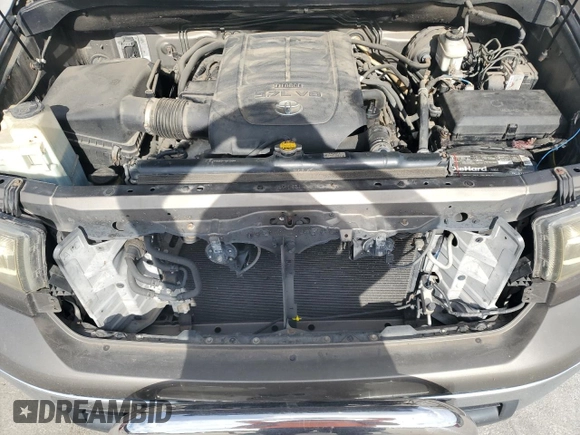 2012 Toyota Tundra z VIN 5TFDW5F14CX216264, wystawiony jako Copart lot #60983285 z przebiegiem 186 869 mil mil oraz Szkoda całkowita • Salvage title. Historia ofert i sprzedaży dostępna na DreamBid. Obrazek 11.