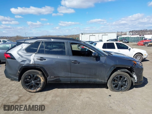 2024 Toyota RAV4 Hybrid SE with VIN 2T3T6RFV0RW051283, listed as a IAAI auction lot 41698931 with 6,465 mi miles and . Bid and sale history available at DreamBid. Image 14.