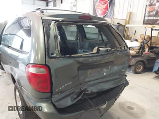 2003 Dodge Caravan SE with VIN 1D4GP24313B191319, listed as a IAAI auction lot 41398477 with 220,083 mi miles. Bid and sale history available at carsss.com. Image 6.