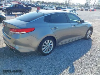 2017 Kia Optima EX with VIN 5XXGU4L31HG137121, listed as a IAAI auction lot 41851689 with 111,835 mi miles. Bid and sale history available at carsss.com. Image 4.