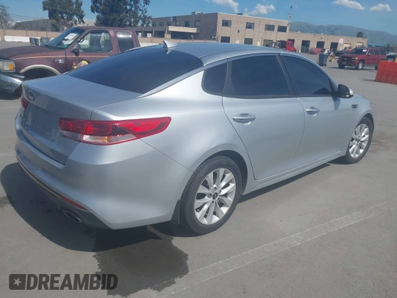 2018 Kia Optima LX with VIN 5XXGT4L31JG267716, listed as a IAAI auction lot 41890611 with 63,491 mi miles and . Bid and sale history available at carsss.com. Image 4.