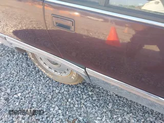 1996 Cadillac Fleetwood z VIN 1G6DW52PXTR713787, wystawiony jako IAAI lot #42079864 z przebiegiem Nie podano mil oraz . Historia ofert i sprzedaży dostępna na DreamBid. Obrazek 14.