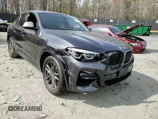 2019 BMW X4 M40i with VIN 5UXUJ5C5XKLJ64004, listed as a Copart auction lot 52106895 with 74,599 mi miles and Salvage title. Bid and sale history available at DreamBid. Image 11.