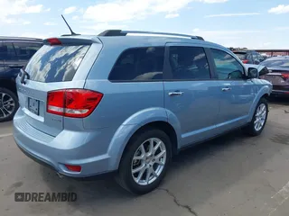 2013 Dodge Journey Crew with VIN 3C4PDCDG4DT680215, listed as a IAAI auction lot 42041962 with 82,705 mi miles and . Bid and sale history available at DreamBid. Image 4.