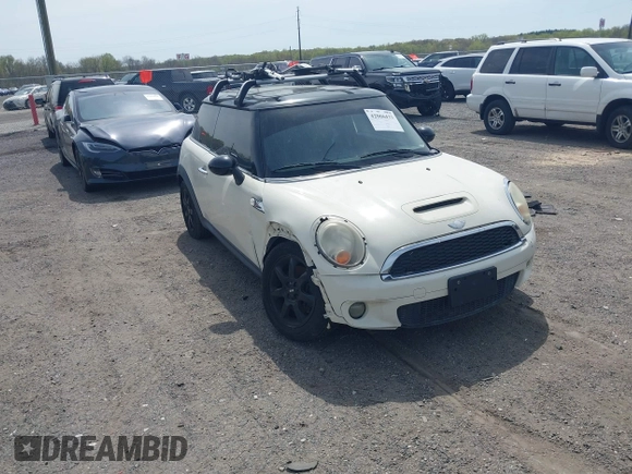 2007 MINI Hardtop S with VIN WMWMF73547TV31403, listed as a IAAI auction lot 42066433 with 156,730 mi miles and . Bid and sale history available at DreamBid. Image 1.