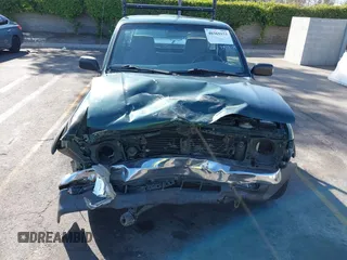 1999 Toyota Tacoma with VIN 4TANL42N7XZ481489, listed as a IAAI auction lot 40365153 with 218,971 mi miles. Bid and sale history available at carsss.com. Image 12.