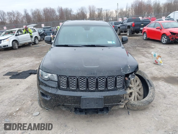 2019 Jeep Grand Cherokee Laredo E with VIN 1C4RJFAGXKC674676, listed as a IAAI auction lot 41942125 with 72,151 mi miles. Bid and sale history available at carsss.com. Image 13.