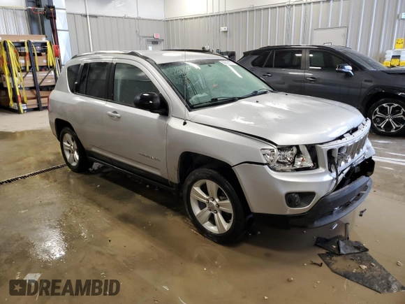 2011 Jeep Compass with VIN 1J4NT1FB0BD245673, listed as a Copart auction lot 82597074 with 207,695 mi miles and Clean Title. Bid and sale history available at carsss.com. Image 4.