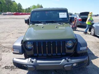 2023 Jeep Wrangler Sport S with VIN 1C4HJXDN0PW695795, listed as a IAAI auction lot 41974691 with 32,734 mi miles and . Bid and sale history available at DreamBid. Image 12.