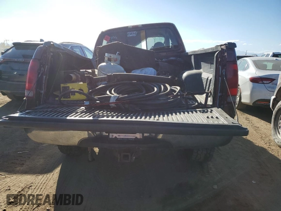 2000 Ford F-350 XL with VIN 1FTSW31F8YEA63048, listed as a Copart auction lot 72357514 with 159,954 mi miles and Salvage Title. Bid and sale history available at DreamBid. Image 6.