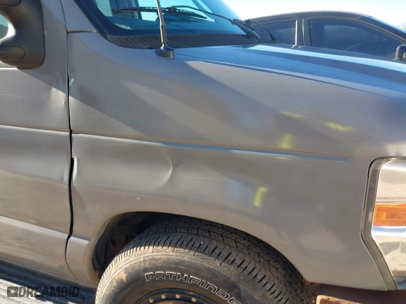 2012 Ford Econoline Wagon XL with VIN 1FBSS3BL1CDA76758, listed as a IAAI auction lot 41648496 with 278,048 mi miles. Bid and sale history available at carsss.com. Image 19.