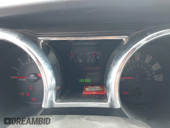 2005 Ford Mustang Deluxe z VIN 1ZVFT84N755215467, wystawiony jako IAAI lot #42452885 z przebiegiem 126 366 mil mil oraz . Historia ofert i sprzedaży dostępna na DreamBid. Obrazek 7.