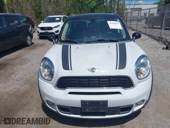 2012 MINI Countryman S z VIN WMWZC3C58CWM26699, wystawiony jako IAAI lot #42361630 z przebiegiem 88 177 mil mil oraz . Historia ofert i sprzedaży dostępna na DreamBid. Obrazek 6.