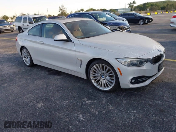 2014 BMW 4 Series 435i with VIN WBA3R1C51EK192795, listed as a IAAI auction lot 41263037 with 22,937 mi miles and . Bid and sale history available at DreamBid. Image 1.