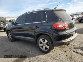 2010 Volkswagen Tiguan Wolfsburg Edition with VIN WVGAV7AX5AW002900, listed as a Copart auction lot 86214514 with 153,645 mi miles and Salvage title. Bid and sale history available at DreamBid. Image 2.