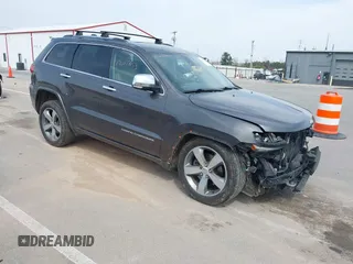 2014 Jeep Grand Cherokee Overland with VIN 1C4RJFCT6EC187098, listed as a IAAI auction lot 42077453 with 172,220 mi miles and . Bid and sale history available at DreamBid. Image 1.