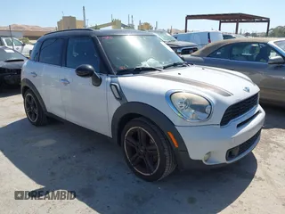 2011 MINI Countryman S z VIN WMWZC3C50BWM26002, wystawiony jako IAAI lot #42383758 z przebiegiem 188 443 mil mil oraz . Historia ofert i sprzedaży dostępna na DreamBid. Obrazek 1.