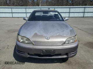 1996 Lexus ES 300 z VIN JT8BF12G3T0149822, wystawiony jako Copart lot #53803495 z przebiegiem 53 648 mil mil oraz Czysty tytuł • Clean title. Historia ofert i sprzedaży dostępna na DreamBid. Obrazek 5.