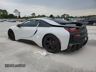 2015 BMW i8 z VIN WBY2Z2C56FV392042, wystawiony jako Copart lot #66972874 z przebiegiem Nie podano mil oraz Szkoda całkowita • Salvage title. Historia ofert i sprzedaży dostępna na DreamBid. Obrazek 2.