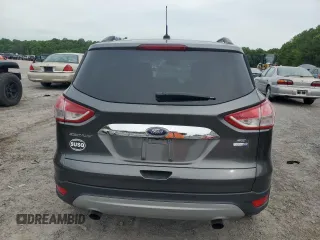 2016 Ford Escape SE z VIN 1FMCU9G95GUC33848, wystawiony jako Copart lot #58191925 z przebiegiem 108 194 mil mil oraz Szkoda całkowita • Salvage title. Historia ofert i sprzedaży dostępna na DreamBid. Obrazek 6.