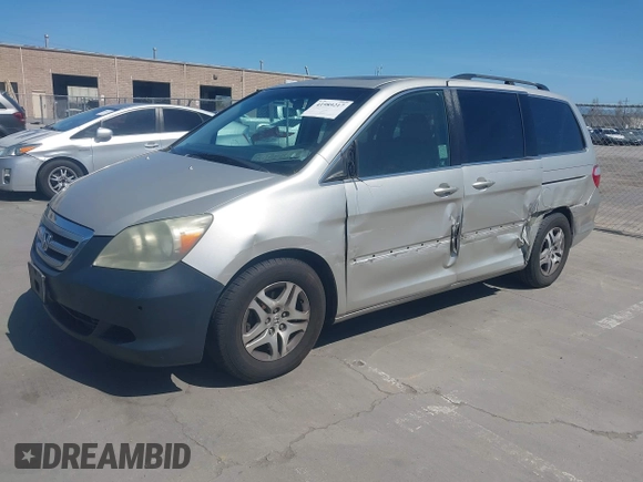 2006 Honda Odyssey EX-L with VIN 5FNRL38766B038599, listed as a IAAI auction lot 41989217 with 164,118 mi miles. Bid and sale history available at carsss.com. Image 19.