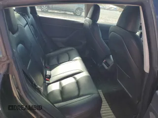2023 Tesla Model 3 with VIN 5YJ3E1EAXPF708001, listed as a Copart auction lot 57252735 with 71,579 mi miles and Salvage title. Bid and sale history available at DreamBid. Image 10.