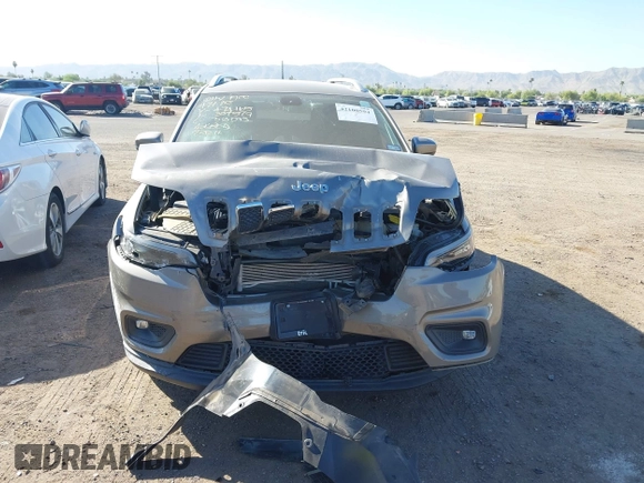 2019 Jeep Cherokee Latitude with VIN 1C4PJLCB2KD474165, listed as a IAAI auction lot 42100594 with 91,363 mi miles and . Bid and sale history available at DreamBid. Image 6.