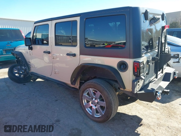 2012 Jeep Wrangler Unlimited Sport z VIN 1C4BJWDG8CL102486, wystawiony jako IAAI lot #41386649 z przebiegiem 156 993 mil mil oraz . Historia ofert i sprzedaży dostępna na DreamBid. Obrazek 3.