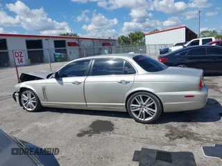 2009 Jaguar XJ with VIN SAJWA94C49TH30042, listed as a IAAI auction lot 41898085 with 145,832 mi miles and . Bid and sale history available at DreamBid. Image 14.