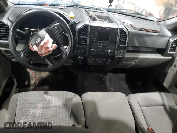 2018 Ford F-150 XL with VIN 1FTFW1E50JFB35013, listed as a Copart auction lot 57240755 with 127,401 mi miles and Salvage title. Bid and sale history available at DreamBid. Image 8.