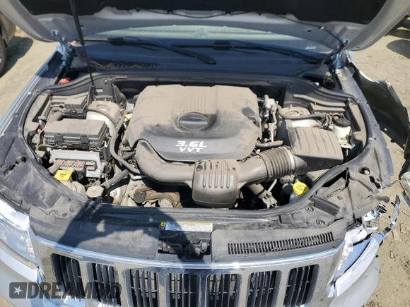 2012 Jeep Grand Cherokee Laredo with VIN 1C4RJFAG4CC123354, listed as a Copart auction lot 52711295 with 151,004 mi miles and Salvage Title. Bid and sale history available at carsss.com. Image 12.