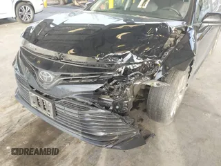 2020 Toyota Camry LE with VIN 4T1C11AKXLU363530, listed as a IAAI auction lot 41670307 with 86,459 mi miles. Bid and sale history available at carsss.com. Image 6.