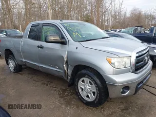 2012 Toyota Tundra z VIN 5TFUM5F12CX029367, wystawiony jako IAAI lot #41602183 z przebiegiem 193 737 mil mil oraz . Historia ofert i sprzedaży dostępna na DreamBid. Obrazek 1.