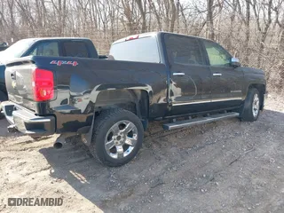 2014 Chevrolet Silverado 1500 LTZ with VIN 3GCUKSEC3EG279778, listed as a IAAI auction lot 41720229 with 241,999 mi miles. Bid and sale history available at carsss.com. Image 4.