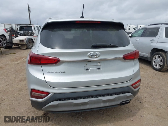2019 Hyundai Santa Fe SE z VIN 5NMS23AD4KH046066, wystawiony jako IAAI lot #41880900 z przebiegiem 45 220 mil mil oraz . Historia ofert i sprzedaży dostępna na DreamBid. Obrazek 17.