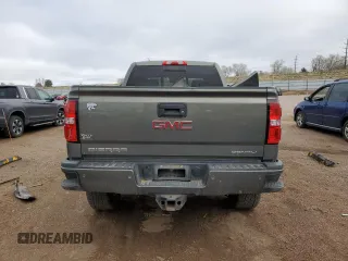 2018 GMC Sierra 2500HD Denali z VIN 1GT12UEY4JF128650, wystawiony jako Copart lot #51102895 z przebiegiem 131 010 mil mil oraz Szkoda całkowita • Salvage title. Historia ofert i sprzedaży dostępna na DreamBid. Obrazek 6.
